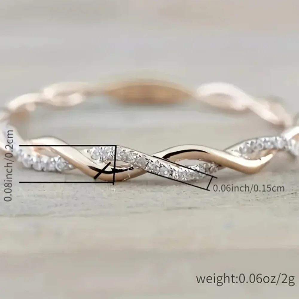 Dainty 14k Gold and Simulated Diamonds CZ Twist Ring